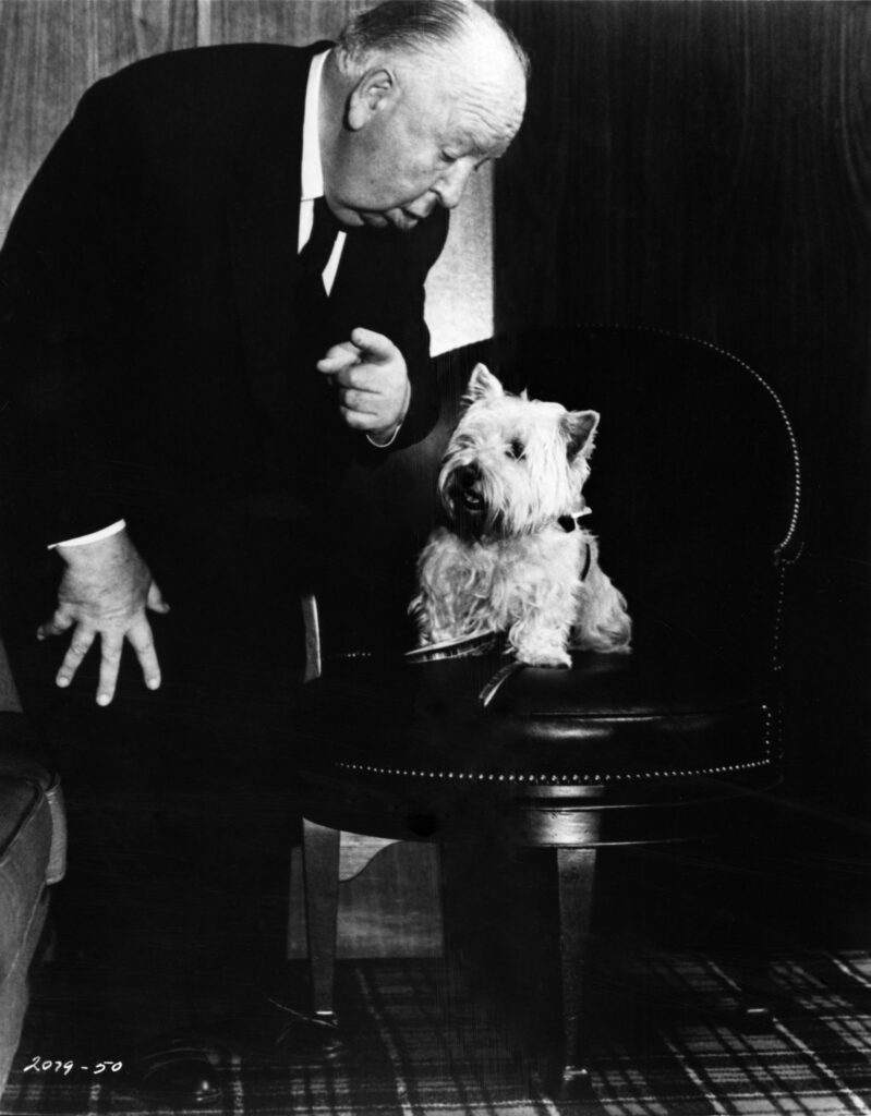 Alfred Hitchcock with his beloved Sarah the terrier who reportedly bit unofficial biographer Donald Spoto much to his ire, 1976 (Courtesy of the Alfred Hitchcock Estate and Margaret Herrick Library, Academy of Motion Picture Arts and Sciences).