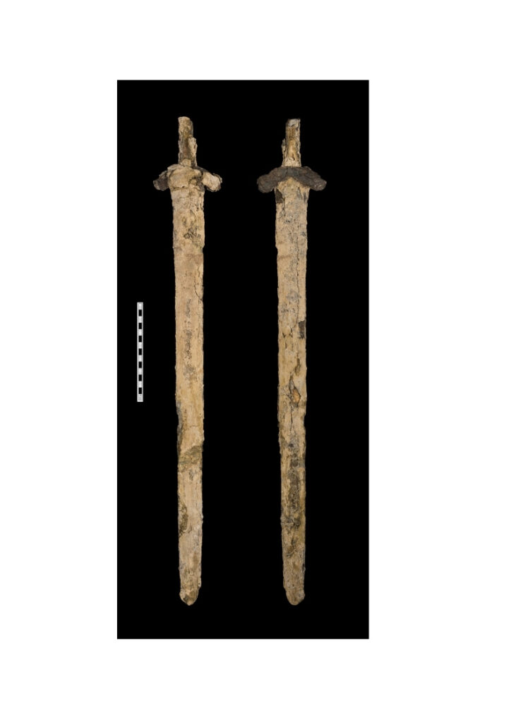 Pattern-welded iron sword found beneath cess on mortar floor of the Saxon cellar 